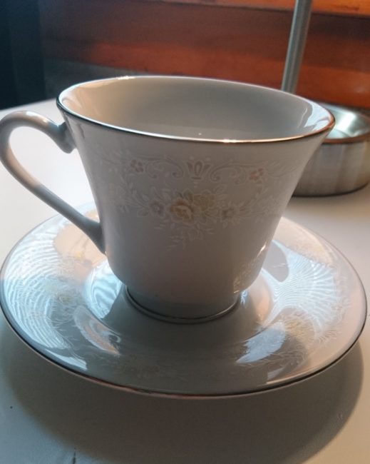 An unpainted tea cup and saucer